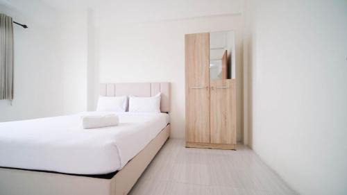 Surabaya Apartment | Best Choice 2BR at Puncak Dharmahusada Apartment Surabaya By Travelio