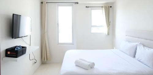 Surabaya Apartment | Best Deal and Comfy Studio at Puncak Kertajaya Apartment By Travelio