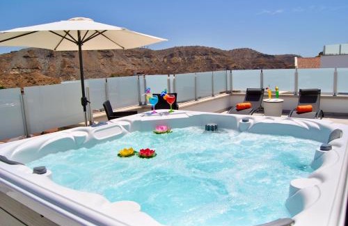 Mogan Villa | Big Villa Tauro with Private Heated Saltwater Pool & Jacuzzi & BBQ & Game Room & Arcade Games