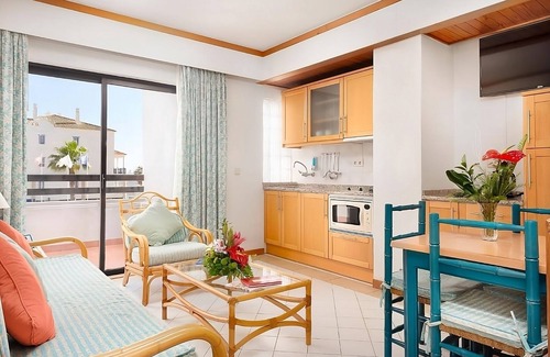 Areias de Sao Joao Hotel | Blissful Getaway! Full Kitchen and Balcony, Swimming Pool, Near Oura Beach!
