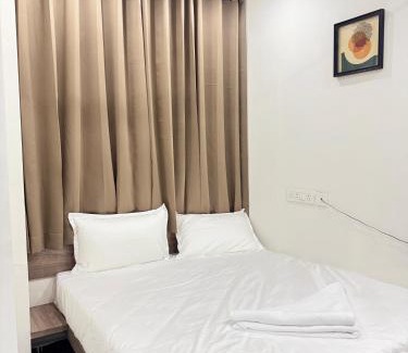 Gachibowli Hotel | Blossom Stays