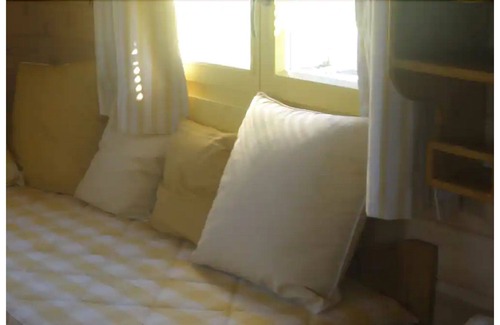 Chomelix House | bohemian stay on the farm, aboard a comfortable and warm trailer