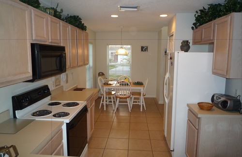 Lake Berkley Villa | BrightwaterVilla. Lake view, west facing extra large pool deck, lanai, hot tub