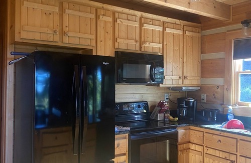 Traphill Cabin | Cabin with Hot Tub on Golf Course Close to Stone Mountain State Park