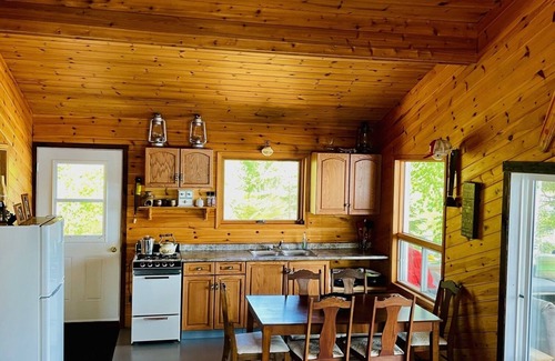 Northern Ontario Cabin | Cabin with large screened deck, on Lake of the Woods in Wiley Bay.