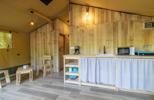 Saint-Martial-de-Nabirat RV Rental | Caravan 'Lodge 8 Personnes' with Shared Pool, Private Terrace and Wi-Fi