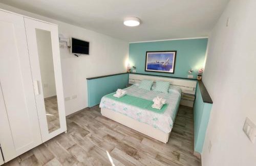 Cala Gonone Apartment | Casa al mare Orchidea - Motoparking - Wifi Free - AC