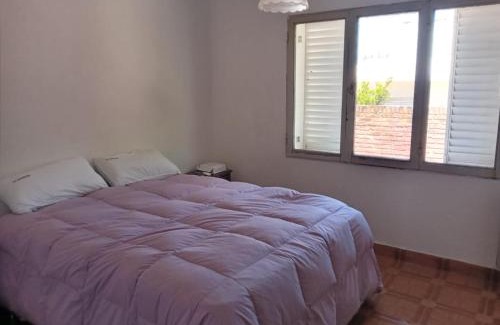 Villa Giardino House | Casa con pileta y excelente ubicación a una cuadra de la plaza principal en Villa Giardino