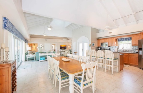 Old Man Bay House | Cayman Sands: Secluded Beach Villa with Pool Atrium & Guest Cottage