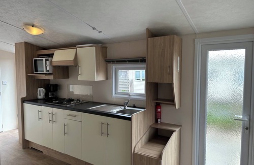 Kamperland Ski Chalet | Chalet Lynn on the beach and sea (Oosterschelde)