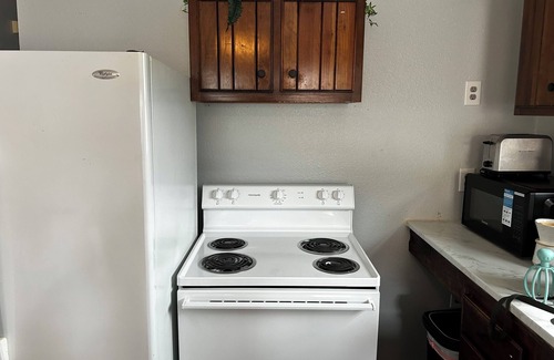Tulane - Gravier Condo | Charming 1-bedroom duplex within steps from Canal Streetcar in New Orleans WiFi