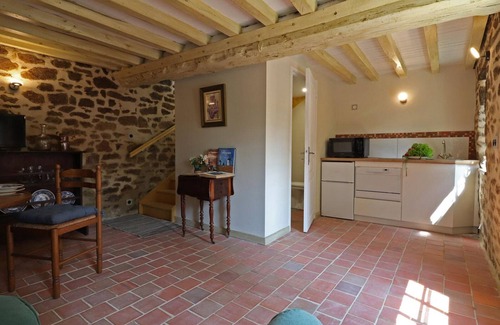 La Carneille Cottage | Charming 15th Century Cottage with Garden, Fishing Pond, and Historic Village Setting