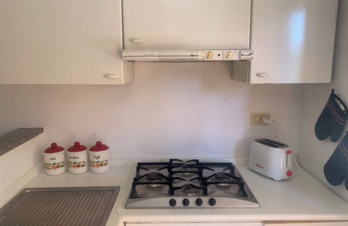 Anzio Condo | Charming 2-bedroom condo with AC, WiFi just Steps from the Beach