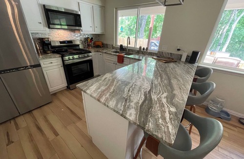 West Congress House | Charming 4-bedroom house with Beautiful Outdoor space in Austin