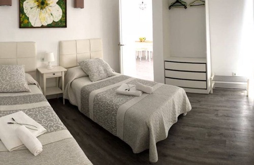 Cala San Vicente Apartment | Charming Holiday Apartment “Can Inma by Modesta A” Close to the Beach with Wi-Fi & A/C; Parking Available, Pets Allowed