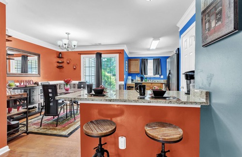 Atlanta House | Charming townhouse with pool, fireplace, washer/dryer, & WiFi. Dogs welcome