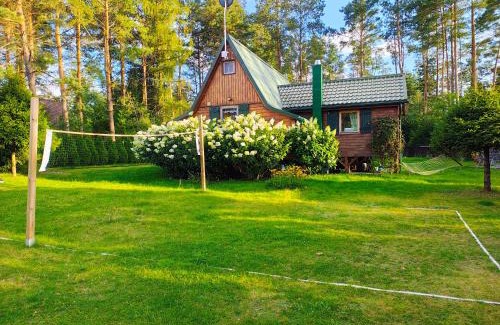 Sulecki Borek House | Chatka Baby Jagi - Domek z balią i kominkiem w lesie pośród jezior