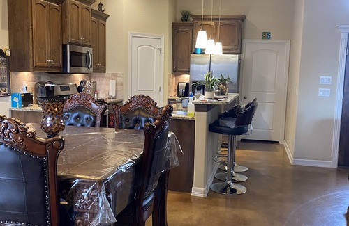 Southside House | Cheerful oasis home with pool and hot tub. 2.5 miles from downtown.