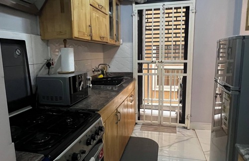 Central Kampala Apartment | Chic 1-bedroom apartment with fitness room and AC in vibrant Kampala
