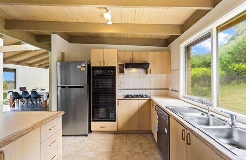 Powlett River House | Clifftop Cocoon Swing into Scenic Sea Views