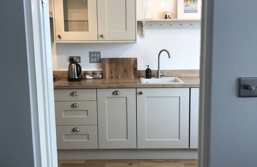 Sandgate Apartment | Coastal garden flat with parking. Pet friendly! Only 2 minutes from the beach!