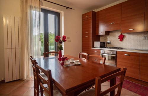 Rivotorto Apartment | Colorful and renovated apartment for six people with air conditioning and kitchen