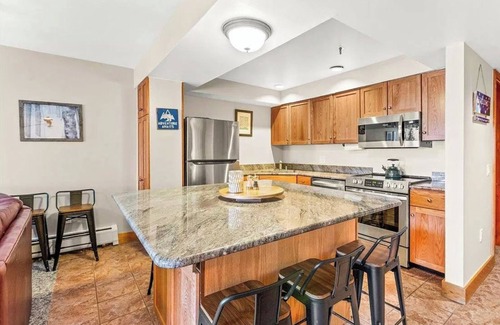 Stratton Mountain Condo | Condo just steps from Tamarack Lift - Cozy up by the fireplace!