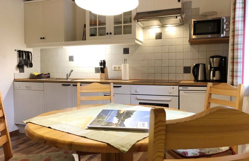 Gnesau Apartment | Cosy apartment for 5 guests with WIFI, hot tub, TV, patio and pets allowed