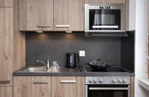 Falera Apartment | Cosy apartment for 6 people with WIFI, pool, TV, balcony and panoramic view