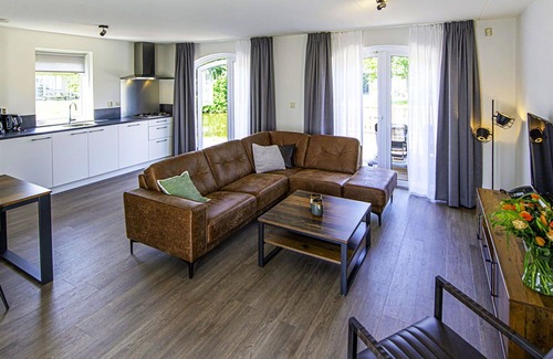 Municipality of Hellevoetsluis House | Cosy apartment in villa for 4 people with pool, WIFI, TV, terrace and parking