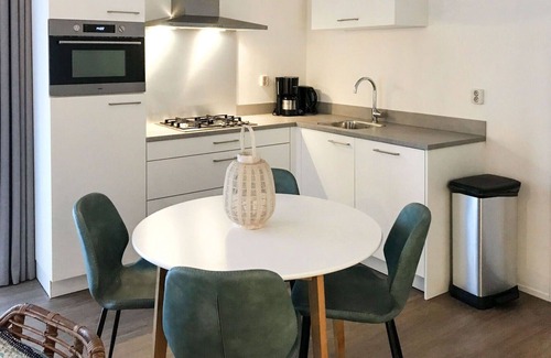 Municipality of Hellevoetsluis House | Cosy apartment in villa for 4 people with pool, WIFI, TV, terrace and parking