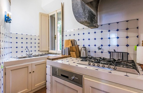 Rosignano Marittimo Apartment | Cosy apartment for 4 people with WIFI, pool, TV and patio