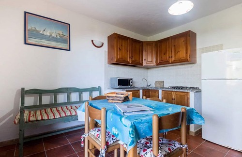 Sant'Antioco House | cottage with sea view terrace /solarium, exclusive garden, 2 bedrooms, 1 bathroom