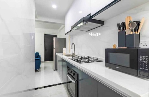 Kilimani Apartment | Cozy 1Bdr with gym and golf simulator ,Yaya center