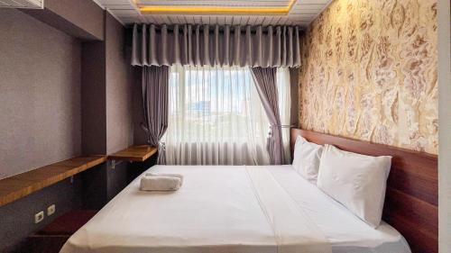 Panakkukang Apartment | Cozy 2BR at Royal Makassar Apartment By Travelio