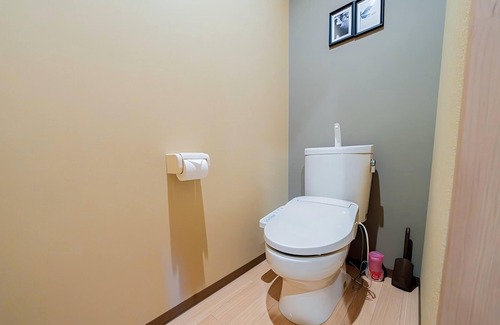 Sonezakishinchi Apartment | Cozy 6 - guest Japanese - themed stay. Great facilities. Private & comfy.