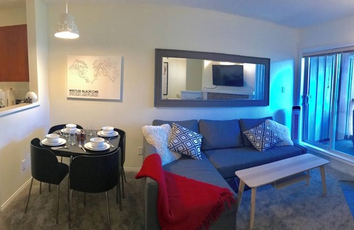 Village North House | Cozy and Bright 1BR Townhouse with big, open deck. Free parking