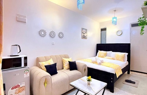 Kasarani Apartment | Cozy and elegant studio in Nairobi fully furnished with detailed interior decor.