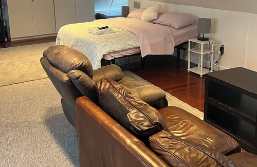 Halfway Apartment | Cozy Attic! With adjustable office space and ergonomic king size bed.
