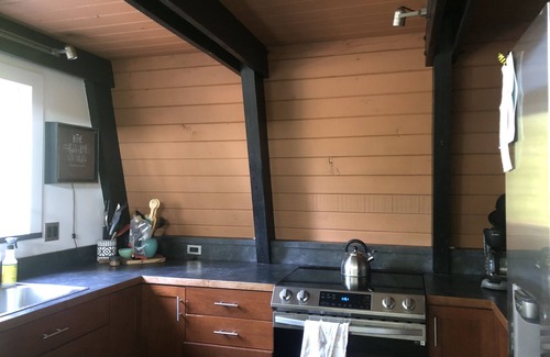 Grapeview House | Cozy Cabin in the woods with Peek-A-Boo Lake views