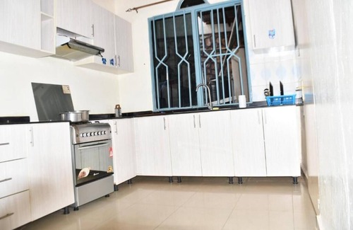 Kigali House | Cozy Double Room with Workspace and Private Bath in Kigali