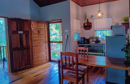 San Ignacio Cottage | Cozy Nature Cabin- King bed, AC, 10 min to downtown & Car rental onsite.