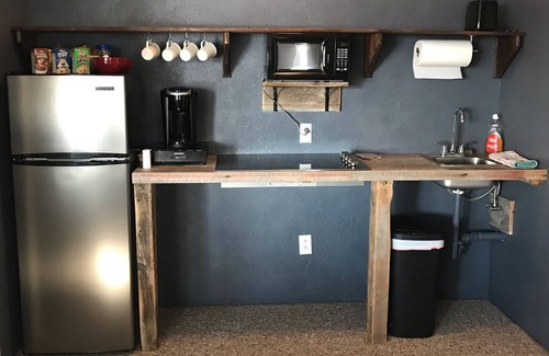 Butte Apartment | Cozy oasis nestled in mature aspen overlooking the city of Butte, Montana