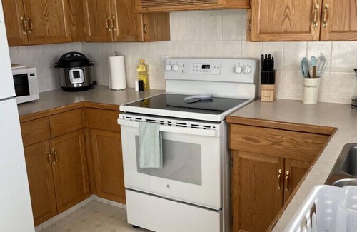 Camrose House | Cozy three bedroom home Cozy three bedroom home