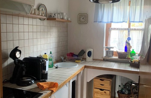 Mahring House | Cozy vacation home with large garden and fireplace, dogs allowed.