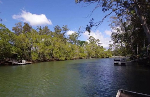 Currumbin Waters House | Currumbin Creek Front - Tropical & Private with Pool