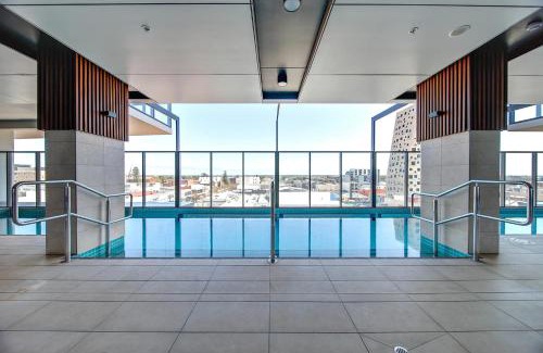 Adelaide Central Business District Apartment | DC vs Marvel Theme ft Arcade Machine Pool Gym Sauna BBQ