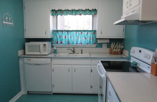 Traverse City Cottage | Delightful Long Lake - Wonderful Frontage - 4 Kayaks, Dock, Fire-pit & Grill