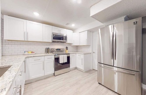 Twin Lakes House | Denver 2 King Beds, Lower Unit with Large Backyard