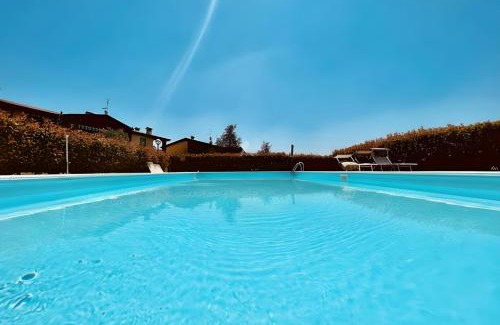 Desenzano del Garda Apartment | DesenzanoLoft Official Partner Homes & Villas by Marriott Bonvoy - Oasis Apartment with garden and pool